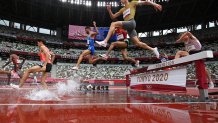 Athletes compete during round one of the Men's 3000m Steeplechase heats