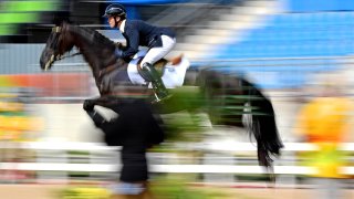 Aug 9, 2016; Rio de Janeiro, Brazil; Elmo Jankari (FIN) rides Duchess Desiree during equestrian eventing jumping in the Rio 2016 Summer Olympic Games at Olympic Equestrian Centre.