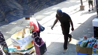 A man seen walking down a street on surveillance video is wanted by police in connection with a violent Queens home invasion.