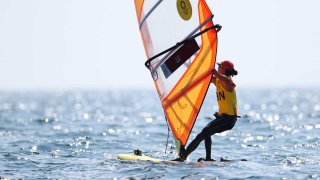 China's Lu Yunxia competes in the windsurfing (RS:X) class