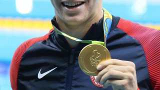 Ryan Murphy of USA celebrates winning the gold medal in the men’s 100m backstroke at the Rio 2016 Olympic Games