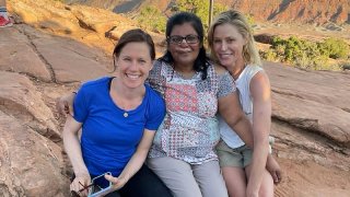 Minnie John, center, poses with actress Julie Bowen, right, and Bowen's sister, Dr. Annie Luetkemeyer