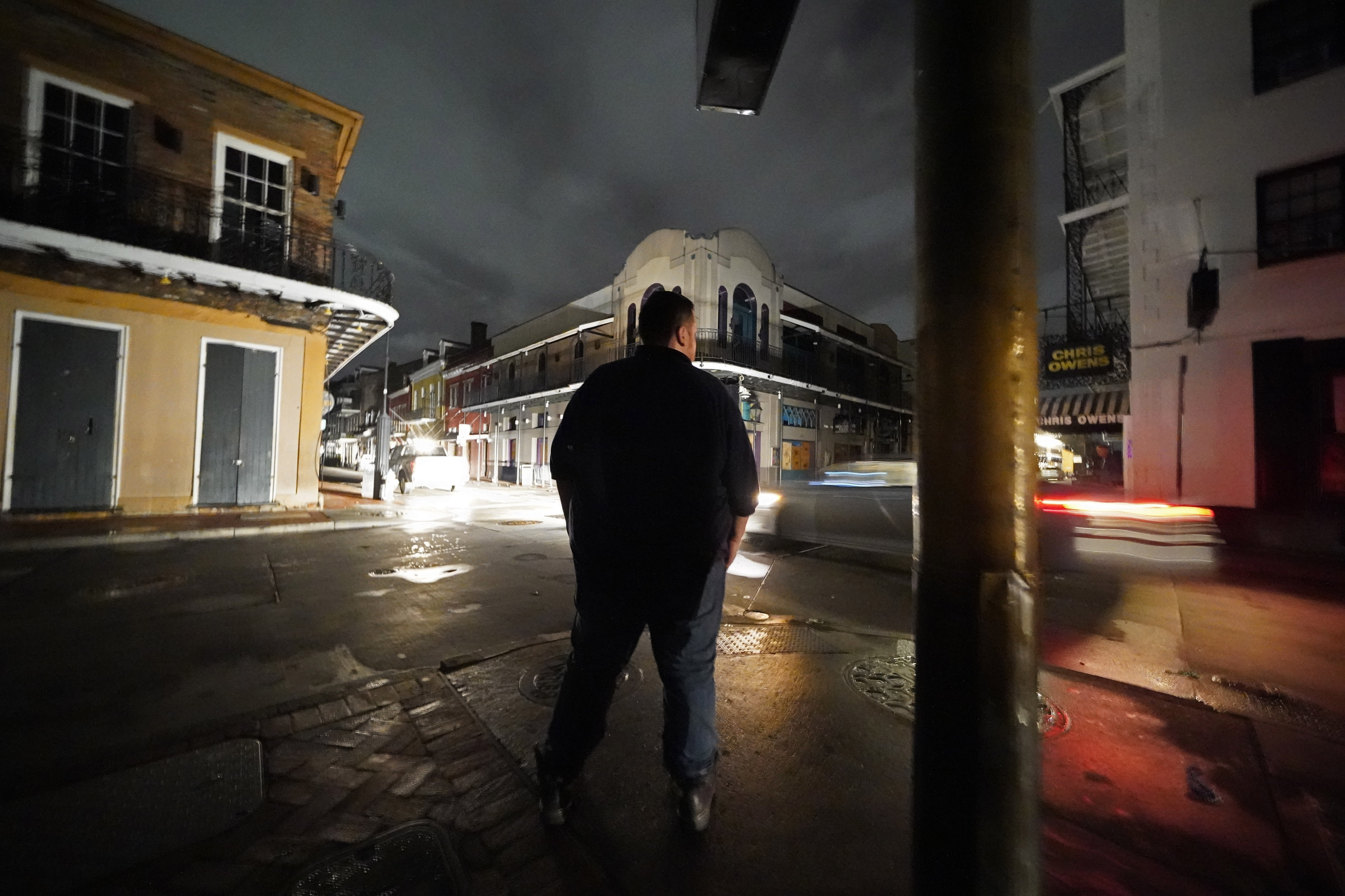 Greg Nazarko, manager of the Bourbon Bandstand bar on Bourbon Street, stands outside the club, where he rode out the storm, after Hurricane Ida that knocked out power in New Orleans, Monday, Aug. 30, 2021.