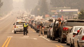Residents are stuck in gridlock while attempting to evacuate as the Caldor fire approaches in South Lake Tahoe.