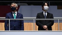 President of the International Olympic Committee (IOC) Thomas Bach, left, and Japan's Emperor Naruhito attend the closing ceremony of the Tokyo 2020 Olympic Games, at the Olympic Stadium, in Tokyo, on Aug. 8, 2021.