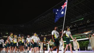 flag bearers Cate Campbell and Patty Mills of Team Australia