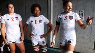 Ilona Maher, Kris Thomas and Abby Gustaitis of Team United States share a laugh as they prepare to take the field for the Women’s pool C match between Team United States and Team Japan during the Rugby Sevens on day six of the Tokyo 2020 Olympic Games at Tokyo Stadium on July 29, 2021 in Chofu, Tokyo, Japan.