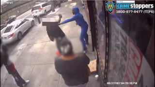 Video image shows a violent stabbing on a sidewalk in Brooklyn.