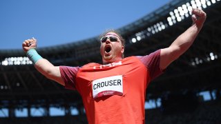Ryan Crouser of Team United States celebrates as he wins the gold medal in the Men's Shot Put Final on day thirteen of the Tokyo 2020 Olympic Games