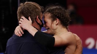 Sarah Hildebrandt cries after her win