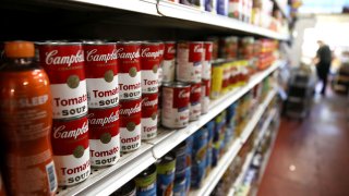 Cans of Campbell’s soup are displayed on a shelf at a grocery store on June 05, 2019 in Richmond, California.