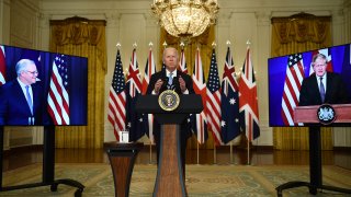 U.S. President Joe Biden in a virtual press conference with British Prime Minister Boris Johnson (R) and Australian Prime Minister Scott Morrison on Sep. 15, 2021. The three leaders announced a new security partnership to strengthen stability in Indo-Pacific.