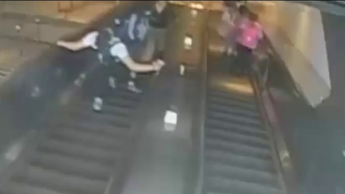 Man Caught on Camera Kicking Woman Down Subway Escalator – NBC New York