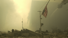 An American flag at ground zero on the evening of Sept. 11, 2001 after the September 11 terrorist attacks on the World Trade Center in New York City.