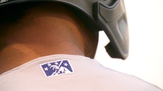 Closeup view of minor league baseball logo on jersey