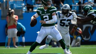 Zach Wilson #2 of the New York Jets throws a pass during the second half against the Carolina Panthers at Bank of America Stadium on September 12, 2021 in Charlotte, North Carolina.