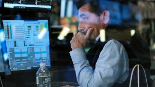Traders work on the floor of the New York Stock Exchange (NYSE) on September 30, 2021 in New York City.