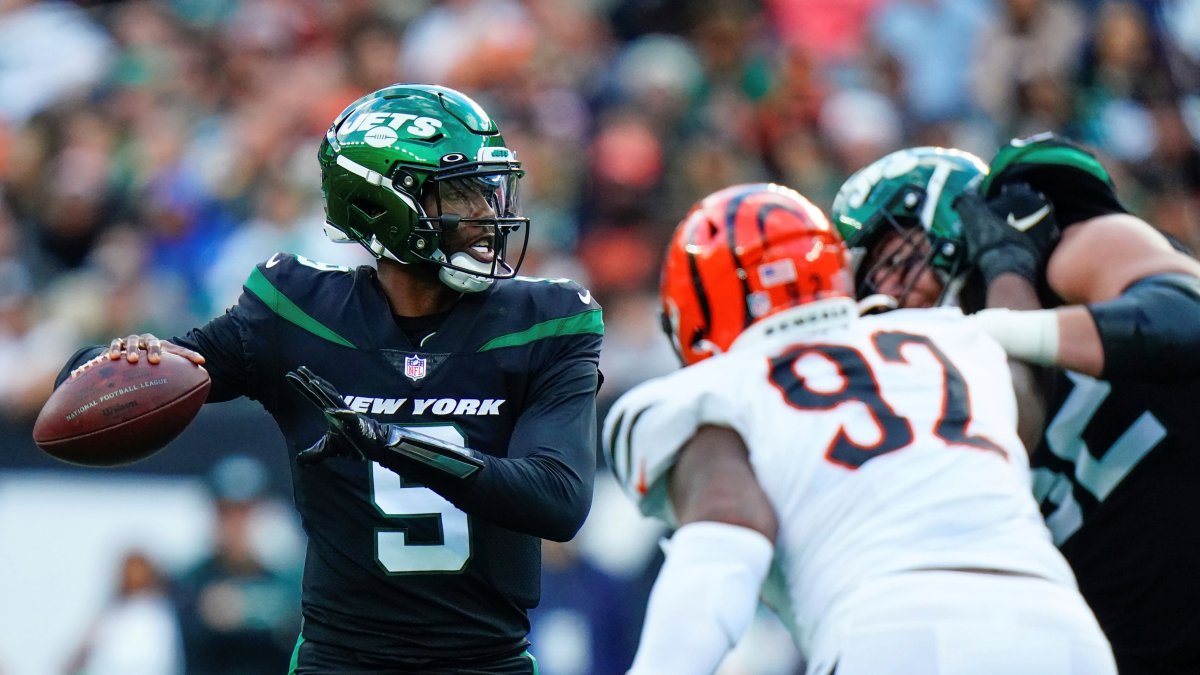 New York Jets quarterback Mike White celebrates after catching a