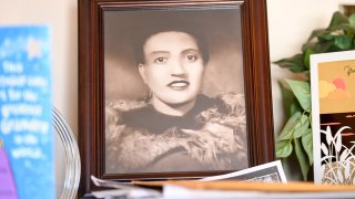 A photo of Henrietta Lacks sits in the living room of her grandson, Ron Lacks, 57, in Baltimore, Maryland, on March 22, 2017.