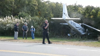 A small plane overshot a runway and plowed into shrubs on Long Island.