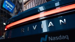 A Rivian R1T electric pickup truck ahead of the company’s IPO outside the Nasdaq MarketSite in New York, U.S., on Wednesday, Nov. 10, 2021.