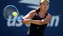 Peng Shuai, of China, returns a shot to Maria Sakkari, of Greece, during the second round of the US Open tennis championships Thursday, Aug. 29, 2019, in New York.