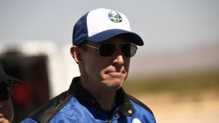 NS-18 crew member, Medidata Solutions Co-Founder, Glen de Vries, attends a press conference at the New Shepard rocket landing pad on October 13, 2021, in the West Texas region