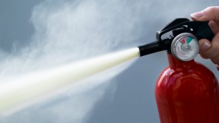 Fire extinguisher being set off