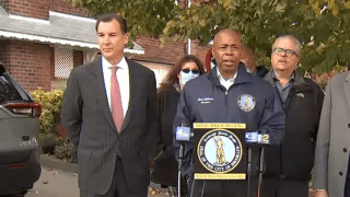 Mayor-elect Eric Adams and Rep. Tom Suozzi hold a press conference in Queens.