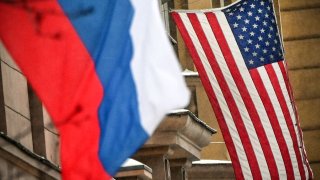 Russian flag flies next to the US embassy