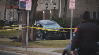 A crashed Honda Pilot rests behind caution tape following a deadly crash with two pedestrians on Long Island, police say.