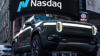 A Rivian R1T electric pickup truck during the company’s IPO outside the Nasdaq MarketSite in New York, on Wednesday, Nov. 10, 2021.