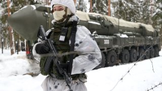 A serviceman of the Teykovo Missile Formation (54th Guards Missile Division) takes part in combat patrol and anti-sabotage drills involving RS-24 Yars road-mobile intercontinental ballistic missile systems.