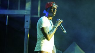 FILE - Young Dolph performs at The Parking Lot Concert in Atlanta on Sunday, Aug. 23, 2020. Family and friends of rapper Young Dolph remembered him Wednesday, Dec. 15, 2021, as a loving father, skilled businessman and generous philanthropist at a ceremony renaming a street in his honor in the same Memphis neighborhood where he grew up and also was gunned down last month.