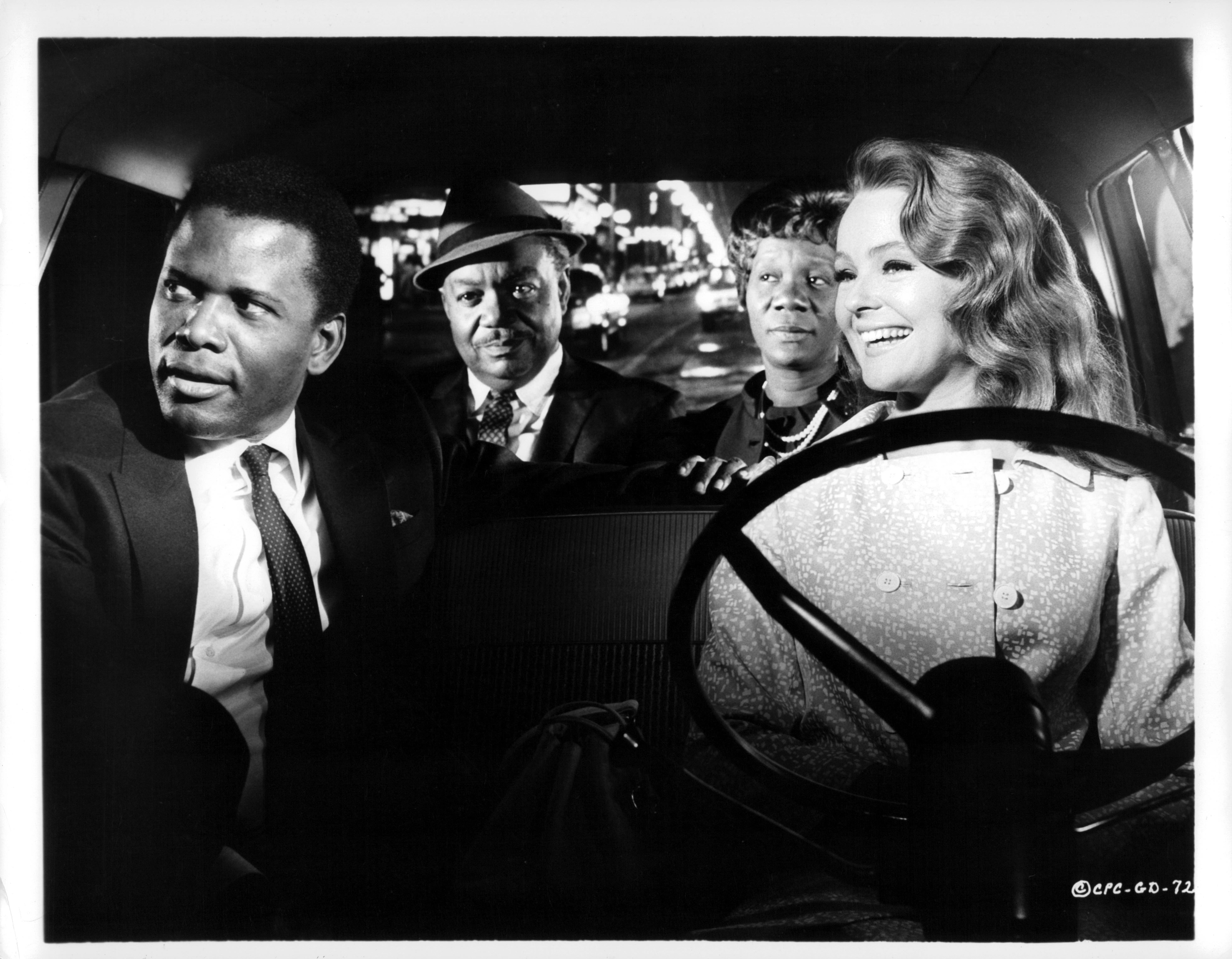 Sidney Poitier, Roy E Glenn, Beah Richards and Katherine Houghton seen in a scene from the film “Guess Who’s Coming To Dinner,” 1967. The film was one of few that depicted interracial marriage favorably despite interracial marriage being illegal in several states at the time.