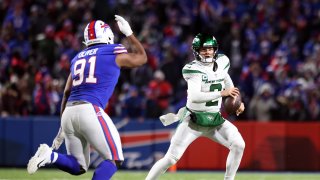 Zach Wilson #2 of the New York Jets scrambles against the Buffalo Bills during the third quarter