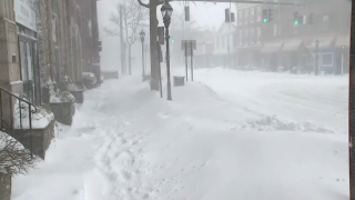 A street on Long Island is quiet, blanketed in several feet of snow during Saturday's blizzard.