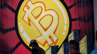 File Photo: Art at the cryptocurrency conference Bitcoin 2021 Convention at the Mana Convention Center in Miami on June 4, 2021.