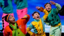 Children dance as part of the pre-show during the opening ceremony of the 2022 Winter Olympics, Feb. 4, 2022, in Beijing.