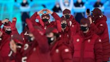 Team Canada arrives during the opening ceremony of the 2022 Winter Olympics, Friday, Feb. 4, 2022, in Beijing.