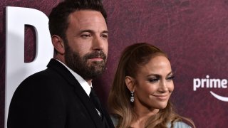 Ben Affleck, left, and Jennifer Lopez arrive at the premiere of "The Tender Bar" on Sunday, Dec. 12, 2021, at the TCL Chinese Theatre in Los Angeles.