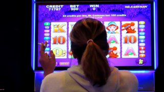 This Feb. 10, 2022 photo shows a gambler smoking while playing a slot machine at the Ocean Casino Resort in Atlantic City