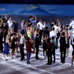 Competitors interact with mascot Bing Dwen Dwen following the Figure Skating Gala Exhibition on day 16 of the 2022 Winter Olympics at Capital Indoor Stadium on Feb. 20, 2022, in Beijing, China.