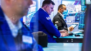 Traders on the floor of the NYSE, March 4, 2022.