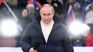 Russian President Vladimir Putin delivers a speech during a concert marking the eighth anniversary of Russia’s annexation of Crimea at Luzhniki Stadium in Moscow, Russia March 18, 2022.