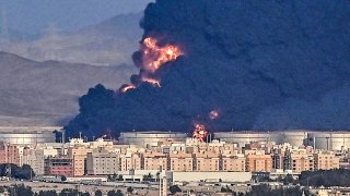 Smoke billows from an oil storage facility in Saudi Arabia’s Red Sea coastal city of Jeddah on March 25, 2022.