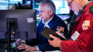 Traders on the floor of the NYSE, March 29, 2022.