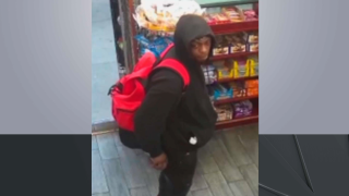 A suspect caught on video wearing a black hoodie and red backpack is wanted for rape.