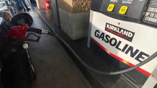 A car is pumping gas at a Costco gas station. The conflict between Ukraine and Russia resulted in increased gas prices in the United States in the past two weeks.