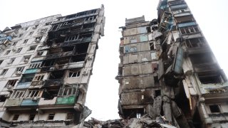 A view of partially destroyed building in the Ukrainian city of Mariupol under the control of Russian military and pro-Russian separatists on April 13, 2022.